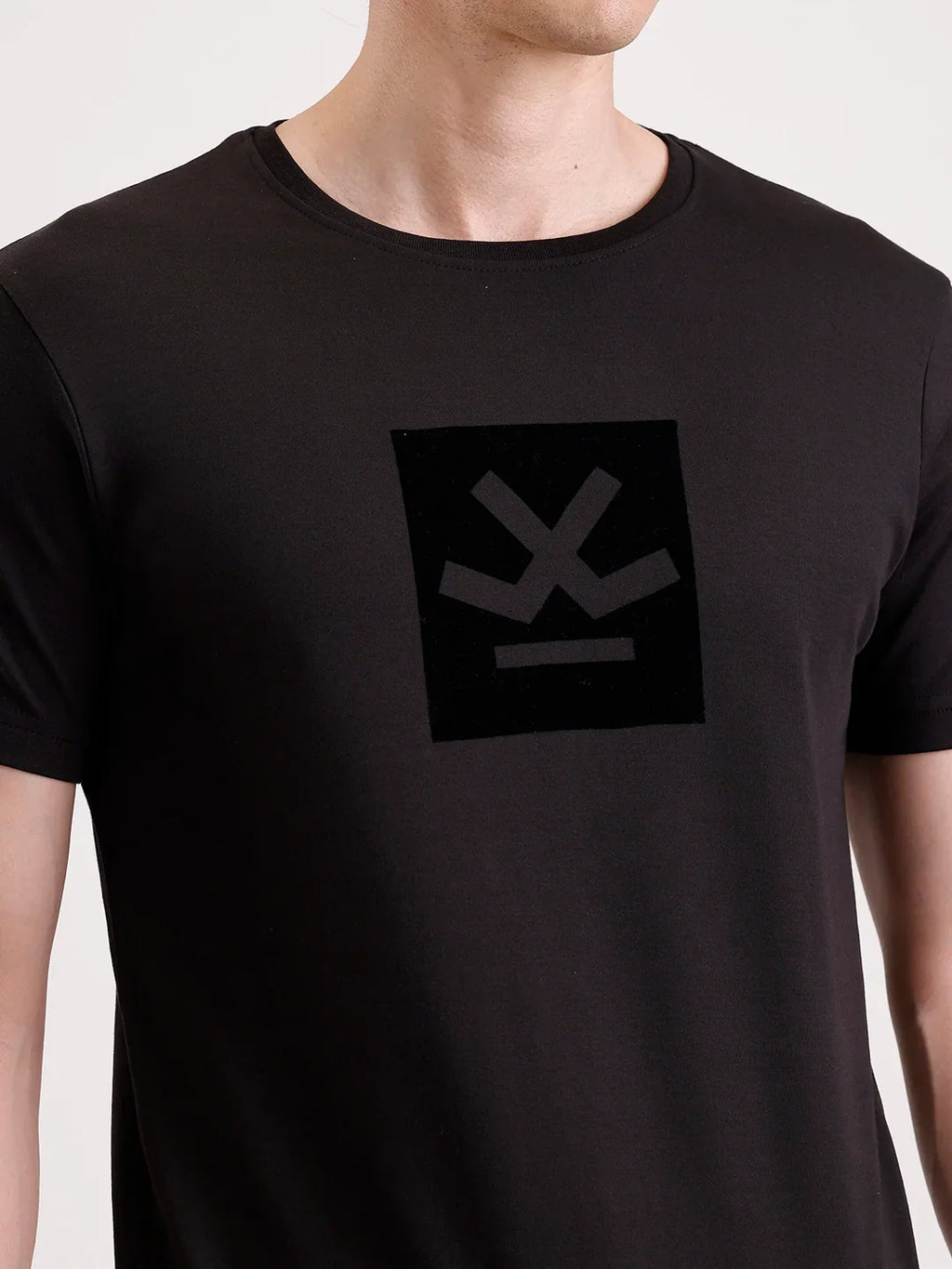 Solid Flock Printed T-Shirt   |  Black